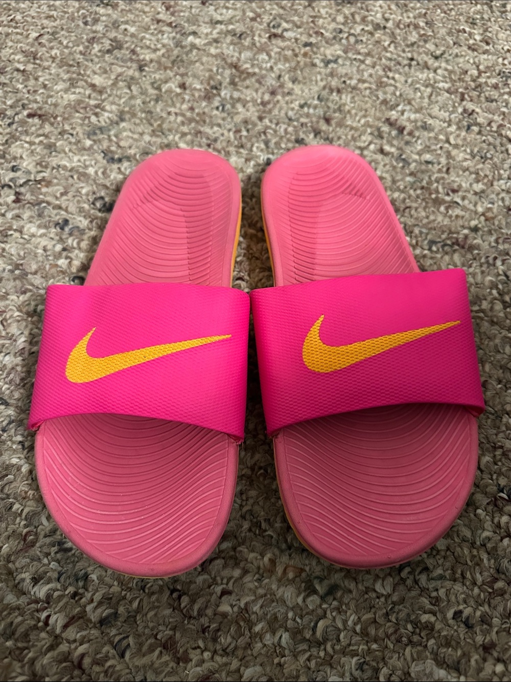 Nike Pink Slide Sandals with Yellow Swoosh